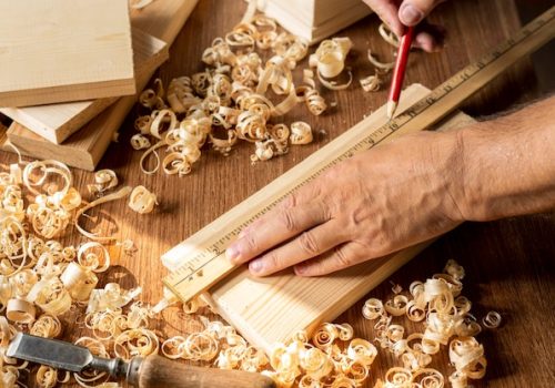 carpenter-working-piece-wood-with-pencil_23-2148679125 carpenter-working-piece-wood-with-pencil_23-2148679125